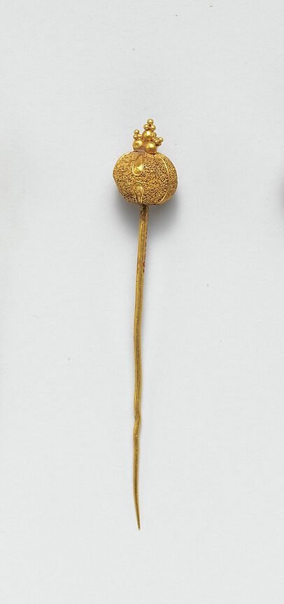 Etruscan gold pin with granulation and filigree